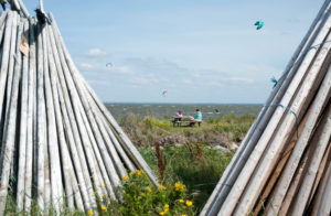 Denmark, Ringkøbing Fjord, wooden pole tents on the beach Denmark, Ringkøbing Fjord, wooden pole tents on the beach